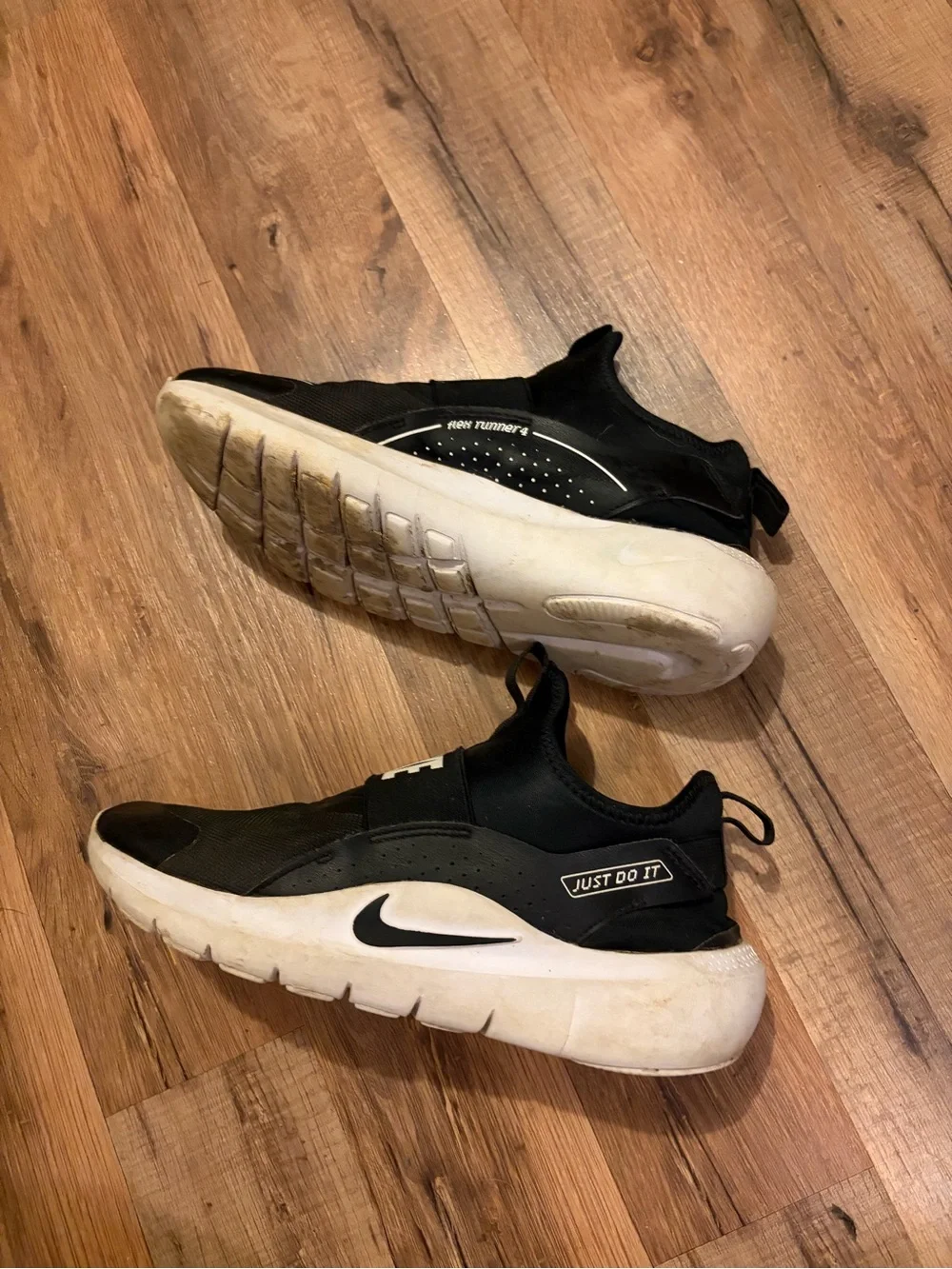 Nike Black Slip-On Sneakers with White Accents
